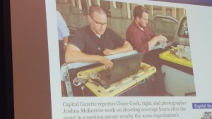 Capital Gazette staff starting working on the next day's paper in the hours after a deadly newsroom shooting, working out of the bed of a truck in a nearby parking garage.